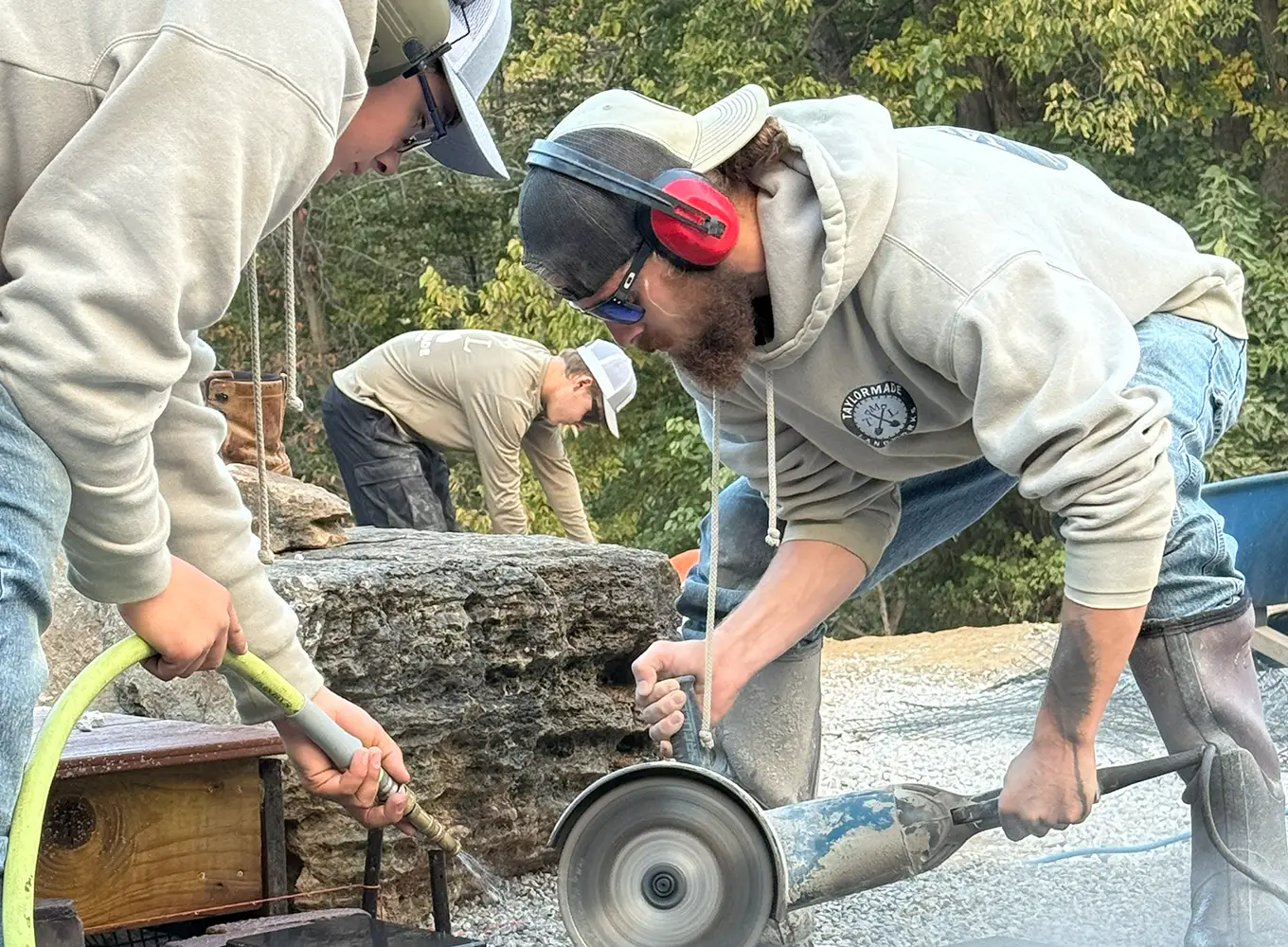 TaylorMade Landworks team working on a patio installation in Springfield IL