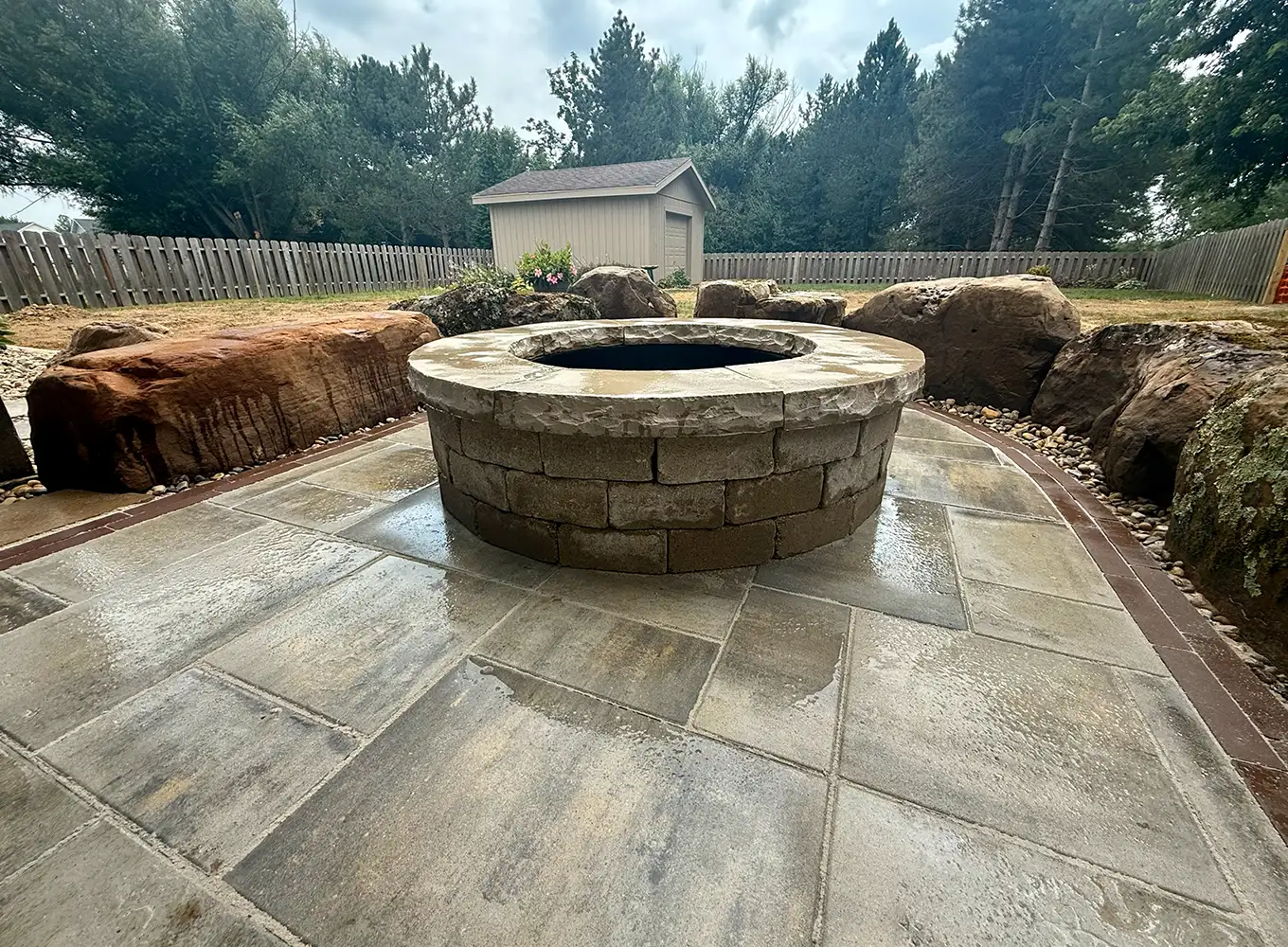 patio with a custom built fire pit in springfield il