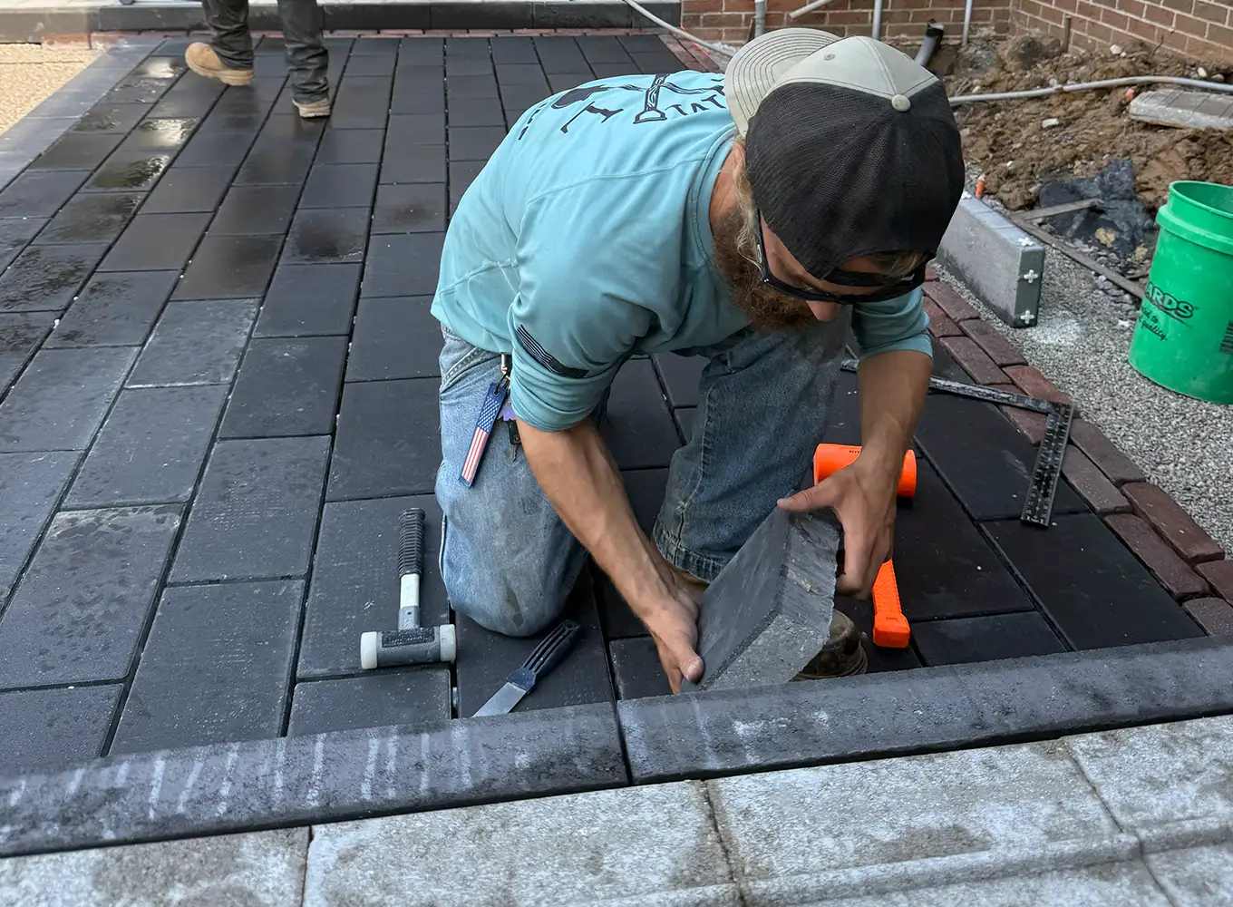 hardscapers installing a paver patio in springfield il