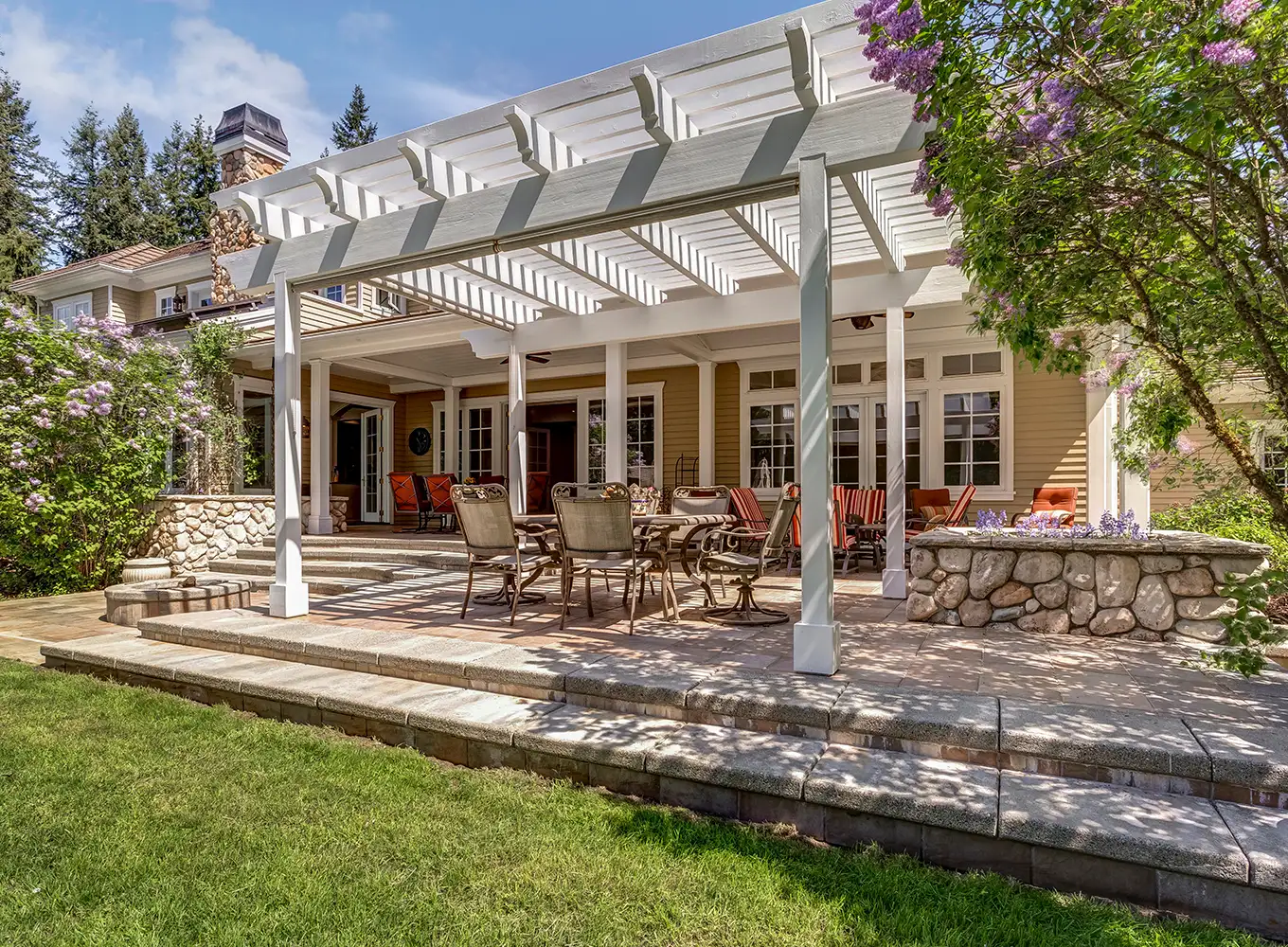 outdoor living space with pergola added for shade in springfield il