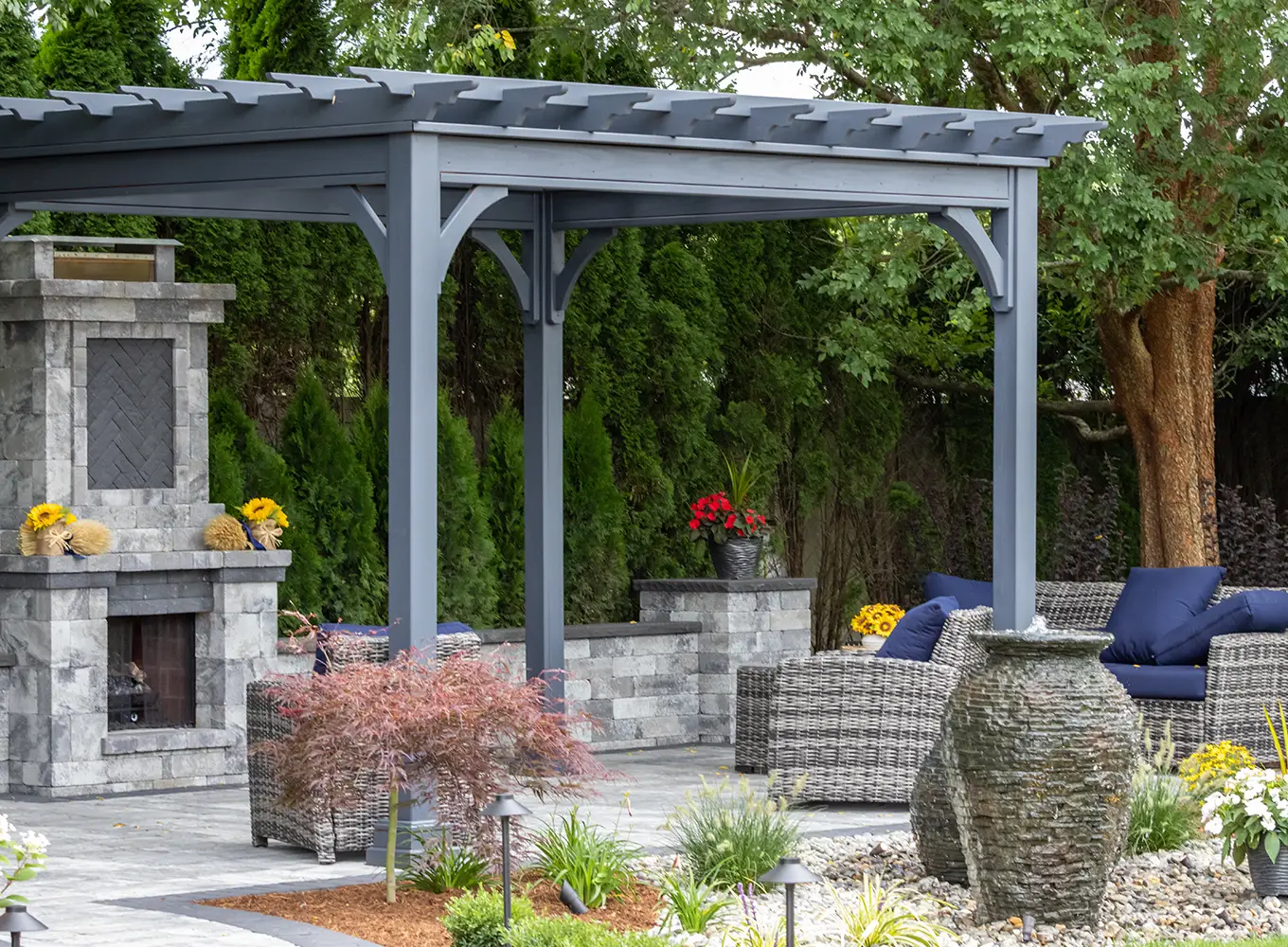 pergola and outdoor fireplace living area - hardscaping services - Springfield IL