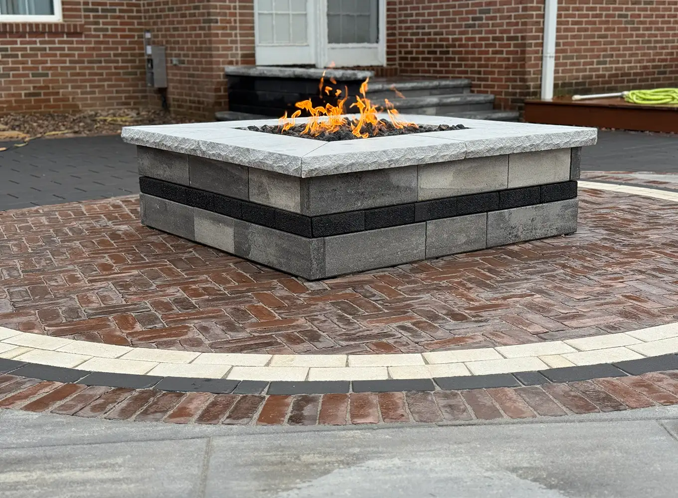 hardscaping fire pit on top of a paver patio in springfield il