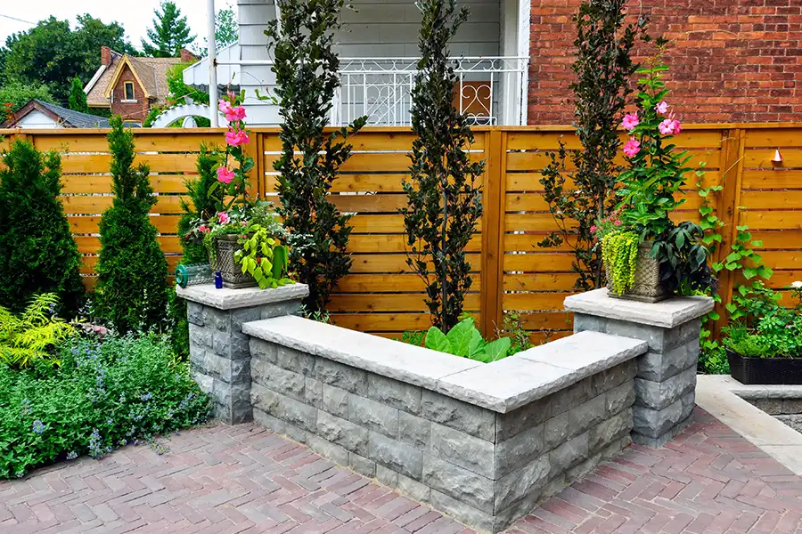 Taylormade Landworks—An example of hardscaping surrounding plants in a Springfield, IL backyard.